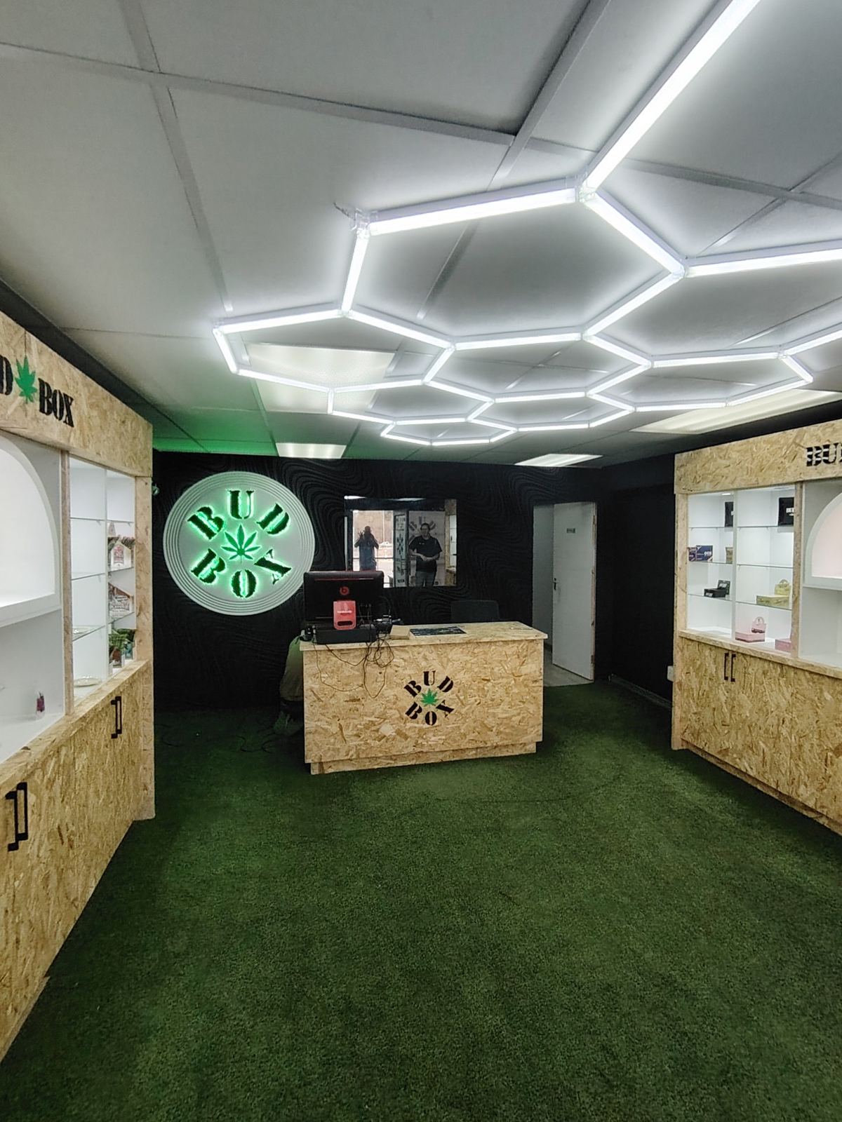 Club interior with the round sign, counter and display walls
